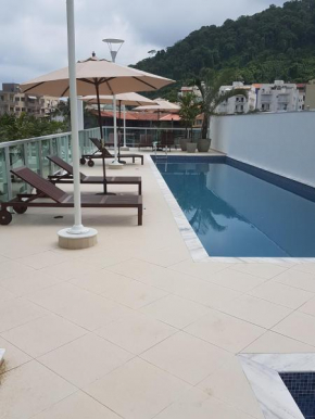 Apartamento em Ubatuba - Praia Grande com Wifi gratuito, rede de proteção e todo conforto que você merece